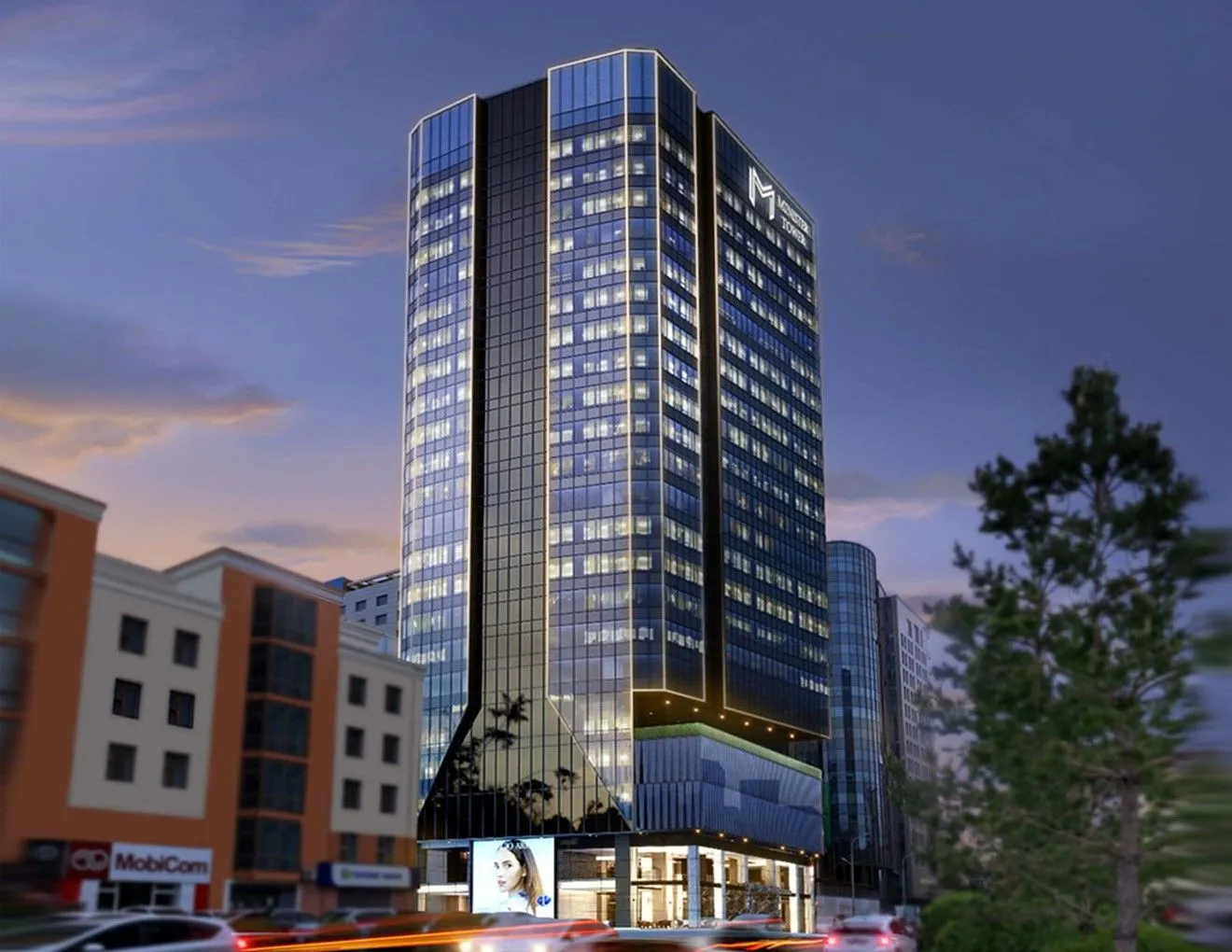 Minister Tower's dark reflective glass façade under evening light
